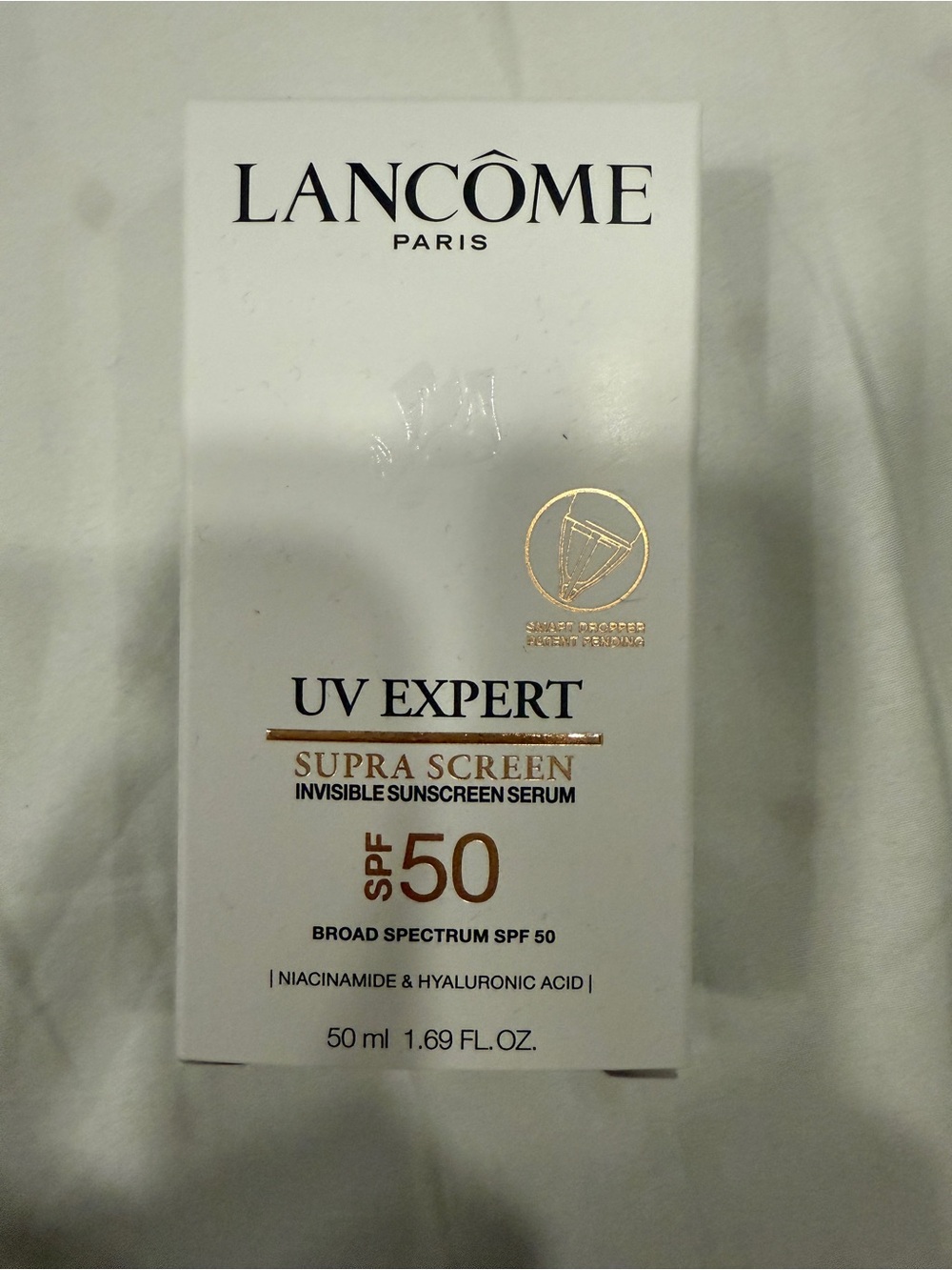Lancôme UV Expert Supra Screen Invisible Sunscreen Serum SPF 50 - White & Gold